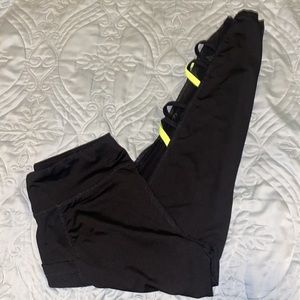 Black and neon yellow leggings